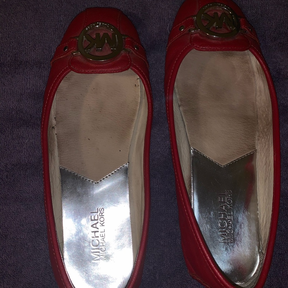 Michael Kor’s  flats